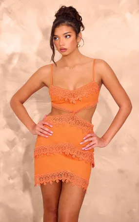 Mini robe effet dentelle orange à découpes