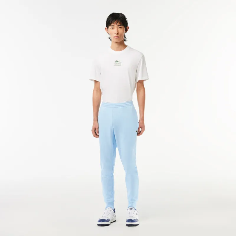 PANTALON DE SURVÊTEMENT HOMME LACOSTE EN MOLLETON DE COTON BIOLOGIQUE BLEU CIEL