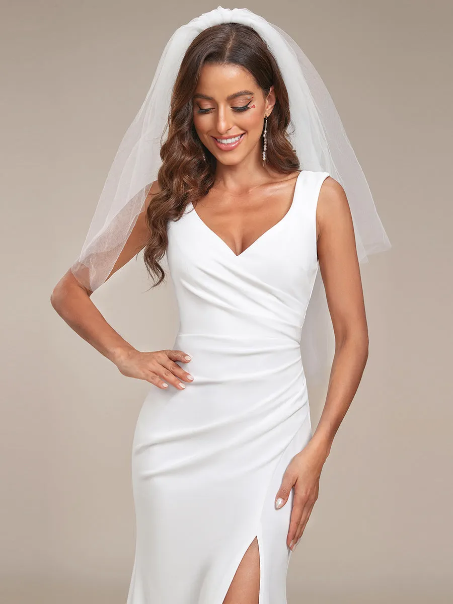 Robe de mariée ajustée et évasée en cœur froncée sans manches